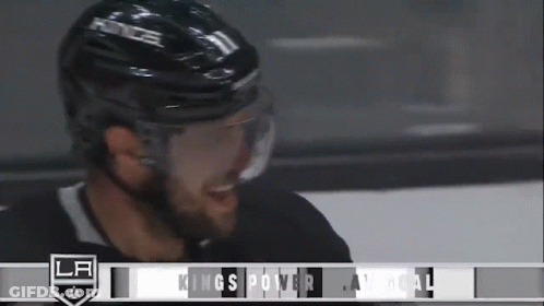 Hockey Player Smiling In Helmet And Goggles By LA Banner GIF