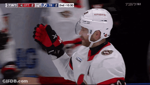Hockey Player Smiling With A On Jersey GIF