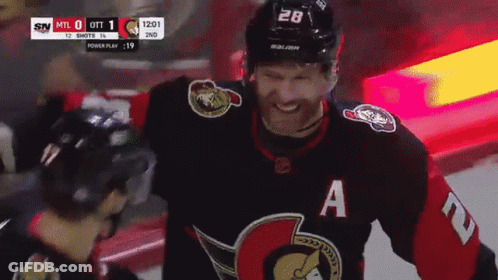 Hockey Player Smiling With A On Jersey GIF