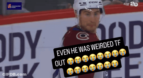 Hockey Player Standing In Front Of Eddy Banner GIF