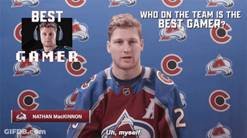 Hockey Player Standing Next To Bauer Stick GIF