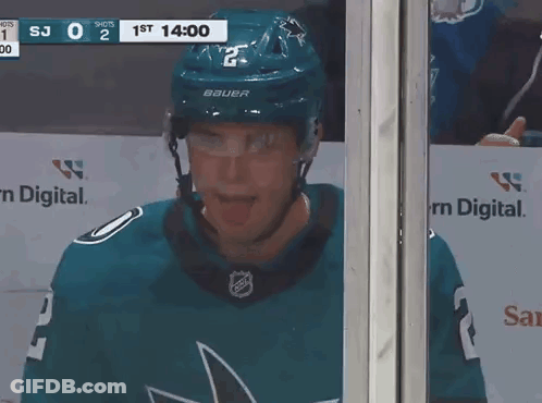 Hockey Player Sticking Tongue Out In Bauer Helmet GIF