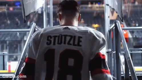 Hockey Player Stutzle Wearing Number 18 Jersey GIF