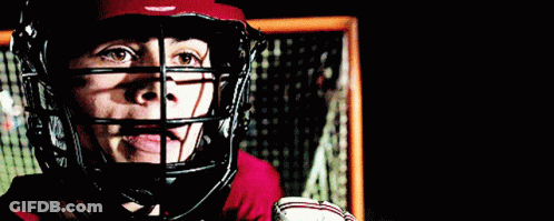 Hockey Player Wearing Helmet And Gloves GIF