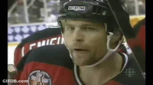 Hockey Player Wearing Helmet Close Up GIF