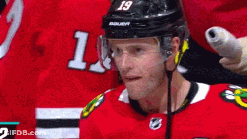 Hockey Player Wearing Helmet Number 19 GIF