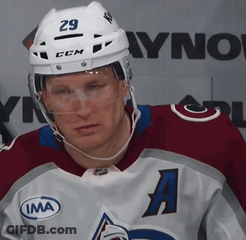 Hockey Player Wearing Helmet Number 29 GIF