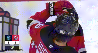 Hockey Player Wearing Helmet Number 86 GIF