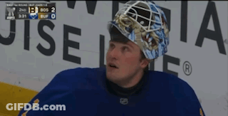 Hockey Player Wearing Helmet With Scoreboard GIF