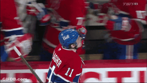 Hockey Player Wearing Number 11 GIF