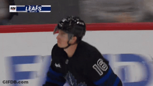 Hockey Player Wearing Number 16 GIF