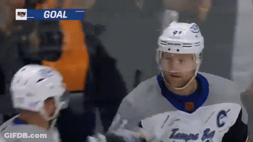 Hockey Player Wearing Number 9 Helmet GIF