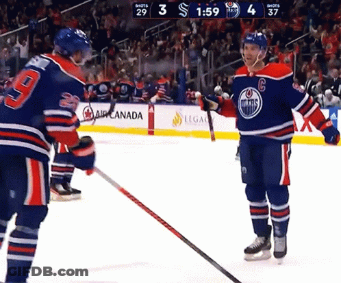 Hockey Player Wearing Number 9 Jersey GIF