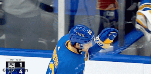 Hockey Player Wearing Stiffel Helmet GIF