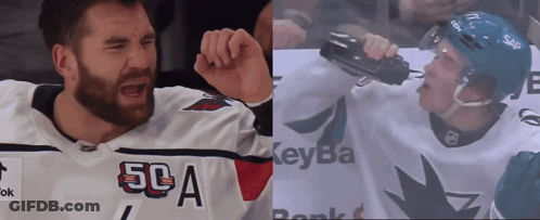 Hockey Player Wilson 13 Hugging Another Player GIF
