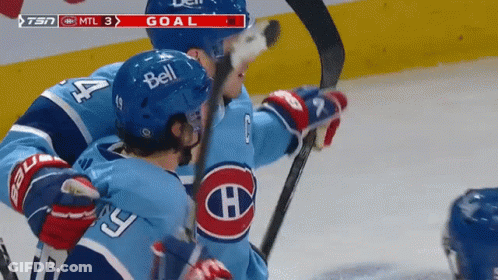 Hockey Player With Bell Helmet Hugging Another Player GIF