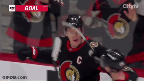 Hockey Player With C Jersey Celebrates Goal GIF