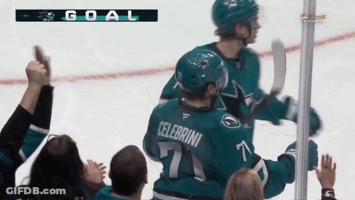 Hockey Player With Celebrini On Back GIF