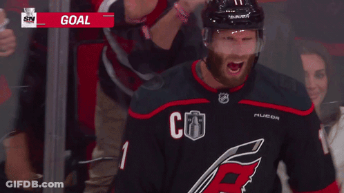 Hockey Player With Goal Helmet GIF