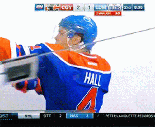 Hockey Player With Hall On Back GIF