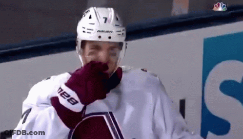 Hockey Player With Helmet And Gloves Number 7 GIF
