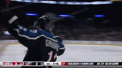 Hockey Player With Number 13 GIF