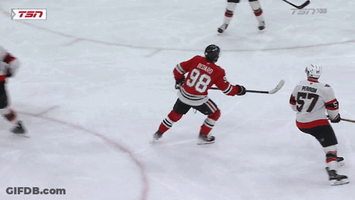 Hockey Player With Number 18 Jersey GIF