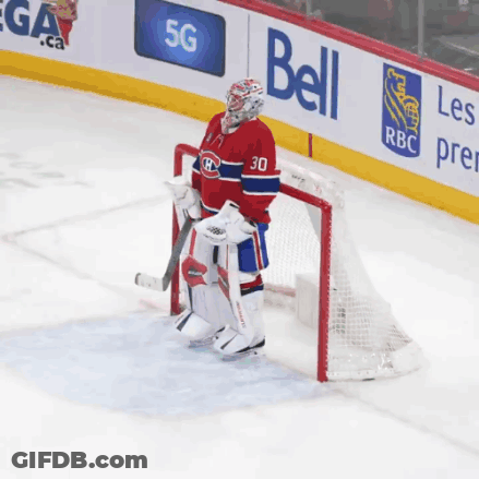 Hockey Player With Number 30 Standing In Front Of Net GIF