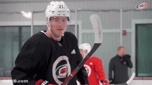 Hockey Player With Number 37 On Helmet GIF