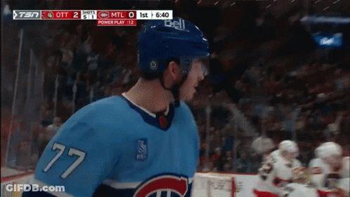 Hockey Player With Number 77 GIF