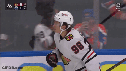 Hockey Player With Number 98 On Shirt GIF
