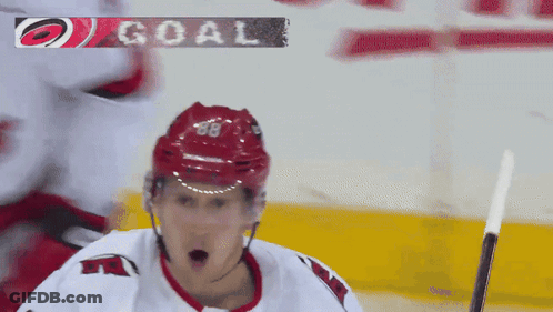 Hockey Player With Red Helmet Number 68 GIF
