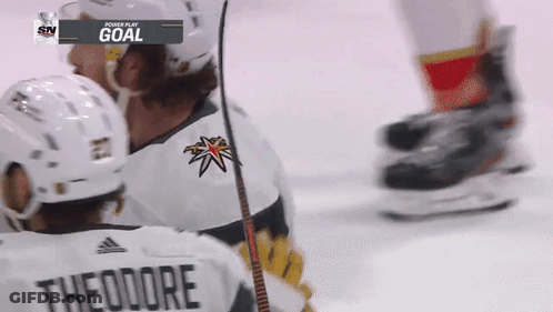Hockey Player With Theodore On Back GIF