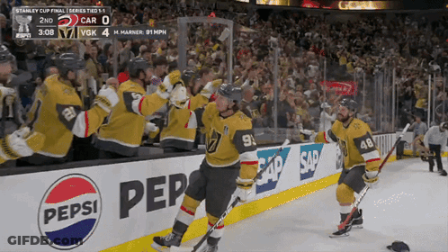 Hockey Players Celebrate Goal In Front Of Pepsi Ad GIF