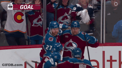 Hockey Players Celebrate Goal GIF