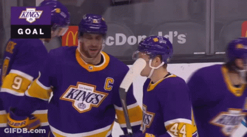 Hockey Players In Purple And Yellow Kings Jerseys GIF