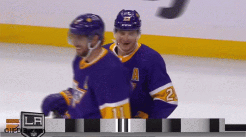 Hockey Players On Ice One With Number 2 GIF