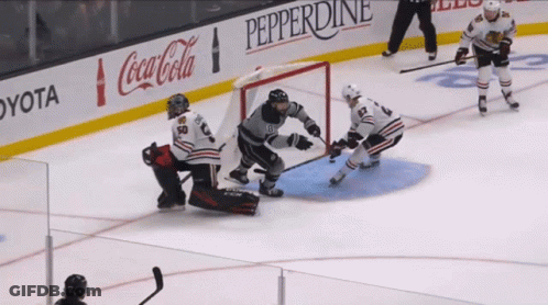 Hockey Players On Ice With Coca-Cola And Pepperdine GIF