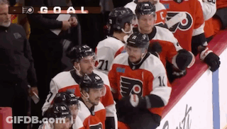Hockey Players On Ice With Number 71 GIF
