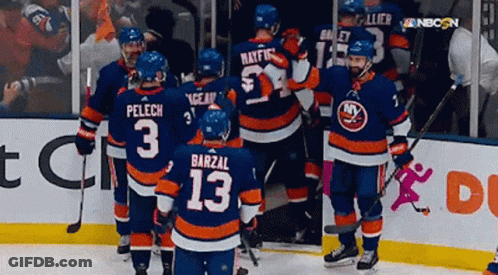 Hockey Players Pelech And Barzal On Ice GIF