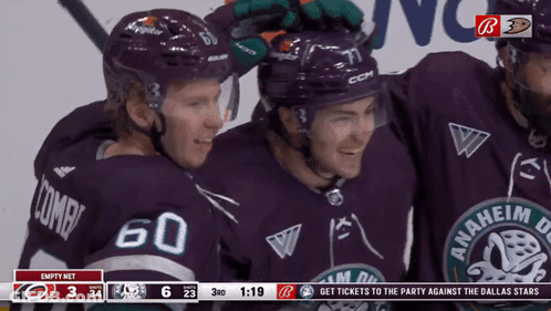 Hockey Players Posing With Ducks Logo GIF