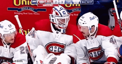 Hockey Players Standing Together GIF