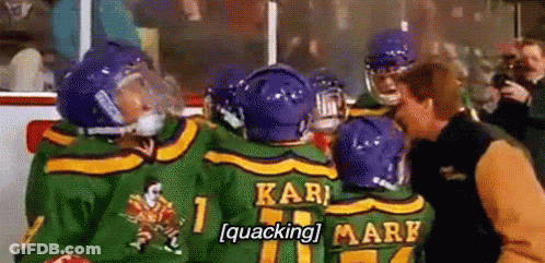 Hockey Players Talking On Ice GIF