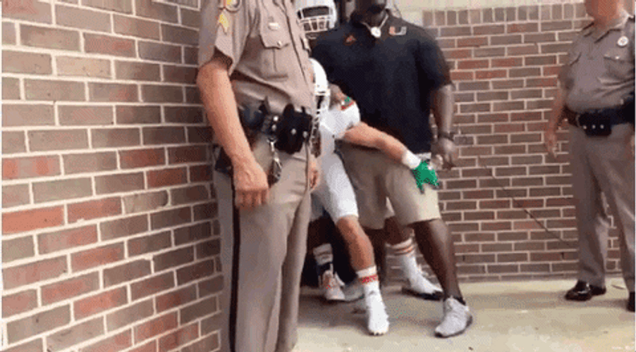 Holding Back Rushing Players GIF