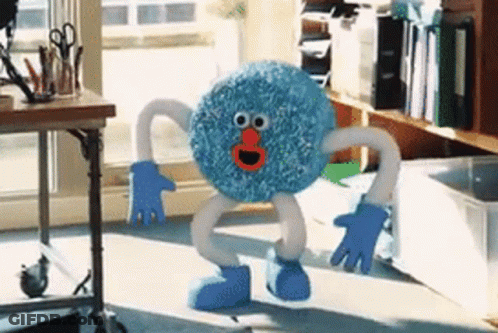 Holding Box Of Smarties Candy GIF