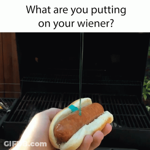 Holding Hot Dog At Grill What Are You Putting On Your Wiener GIF