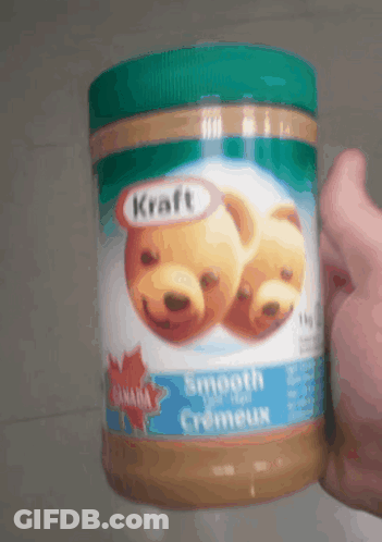 Holding Kraft Smooth Creameux Peanut Butter GIF