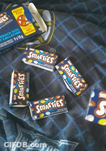 Holding Nestle Smarties Bag GIF