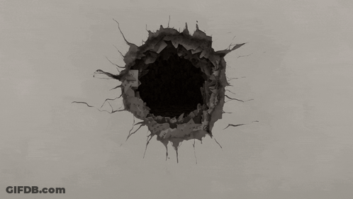 Hole In Wall With Black Center GIF