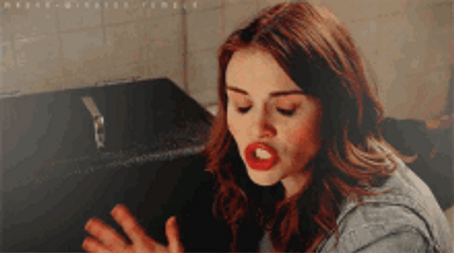 Holland Rioden As Lydia Martin Holding Box GIF